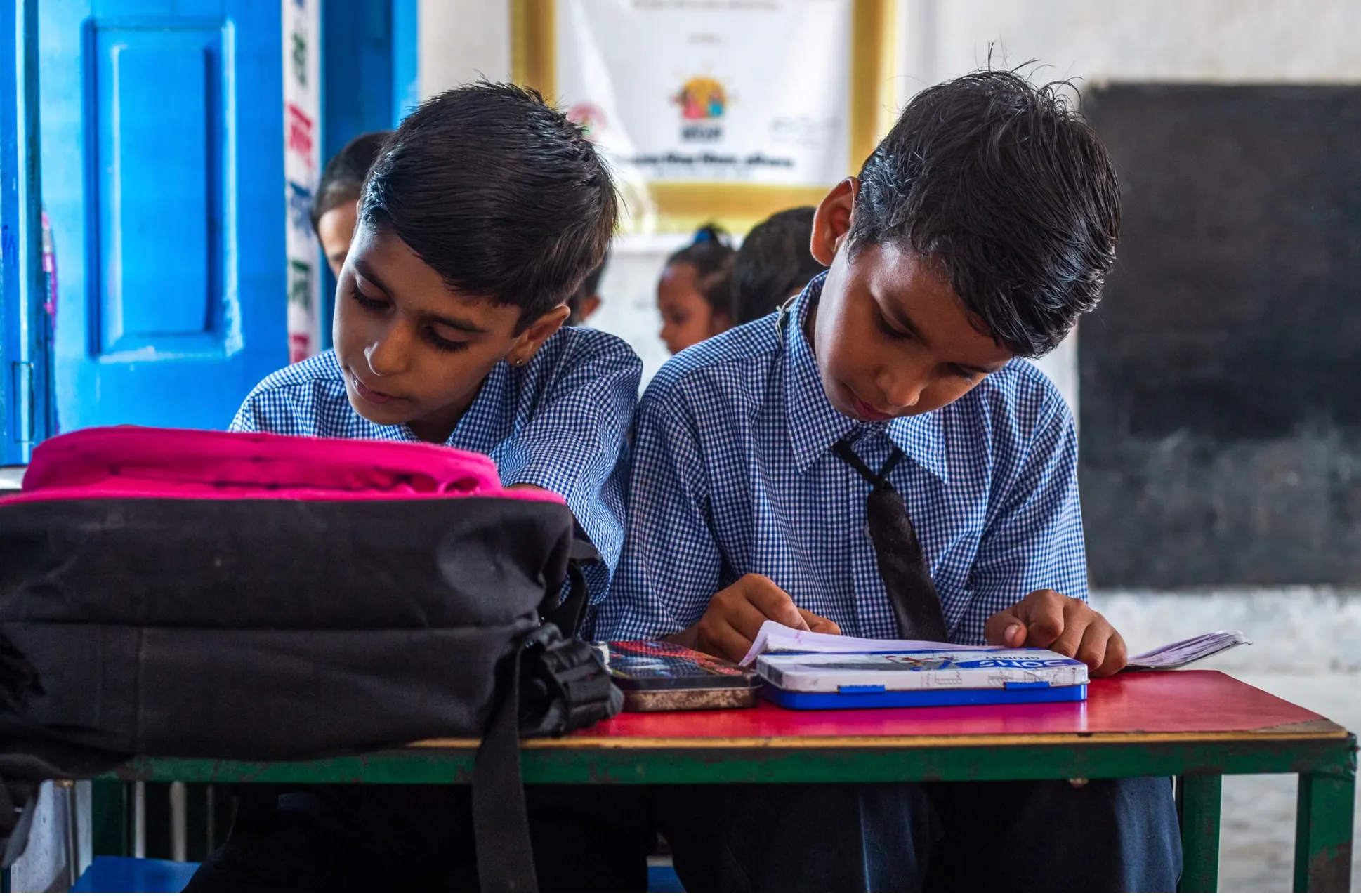 A child reading, referencing Pratham's ASER learning survey